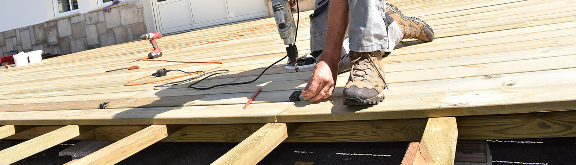 Carpenter building wooden deck